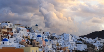 Santorini-(Thira),-Cyclades,-Greece,-cityscape,-sunset,-chapel,-clouds,-2x1